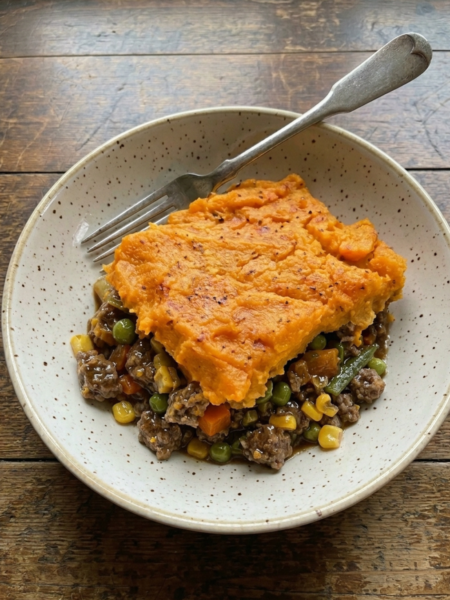 Healthy sweet potato shepherd’s pie baked with ground beef and vegetables